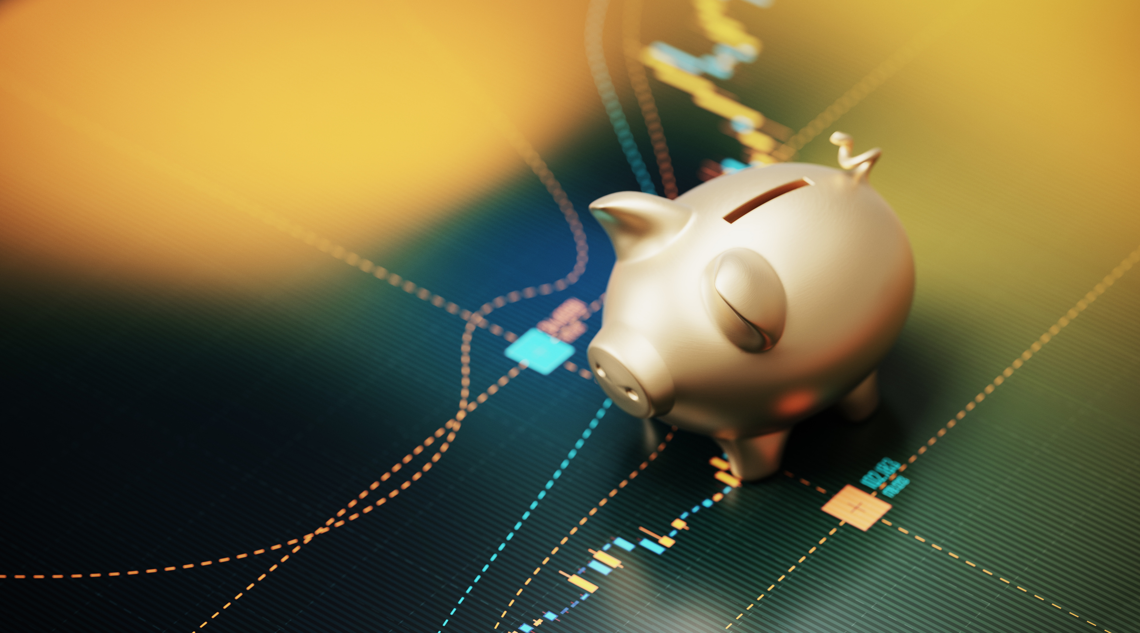 Gold colored piggy bank sitting over a bar graph representing saving in a cash ISA versus investing in a stocks and shares ISA