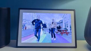 Lexar Pexar picture frame showing men on rainbow pavement in Reykjavik, Iceland