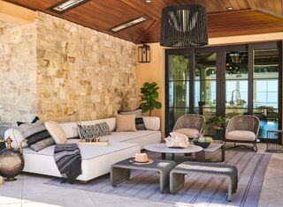 An outdoor living room with garden furniture