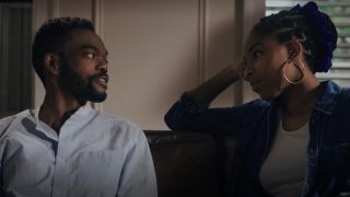 from left to right: William Jackson Harper and Jessica Williams sitting on a couch together in Love Life.