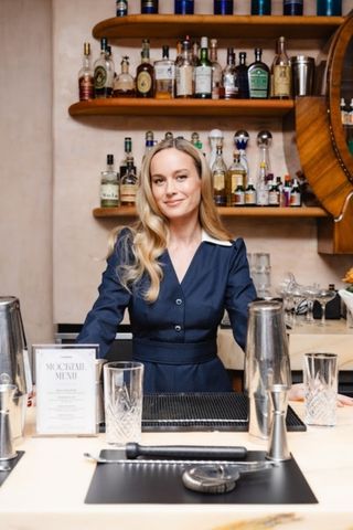 brie larson behind the bar