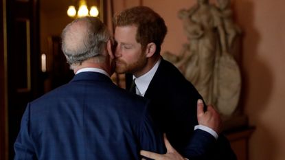 King Charles and Prince Harry greet each other at the International Year Of The Reef 2018 Meeting