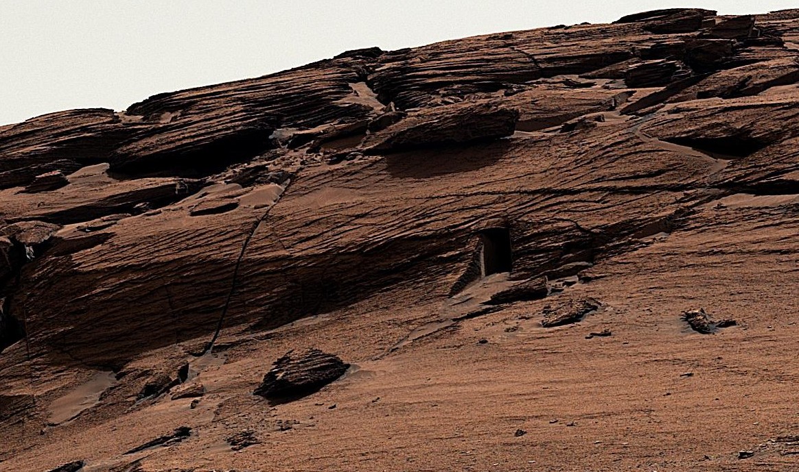 A red rock formation on the surface of Mars.