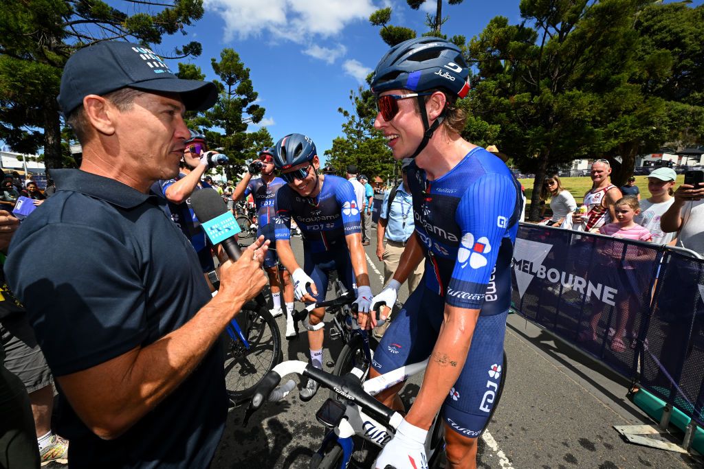 Former pro turned commentator Robbie McEwen interviews race winner Laurence Pithie (Groupama-FDJ)