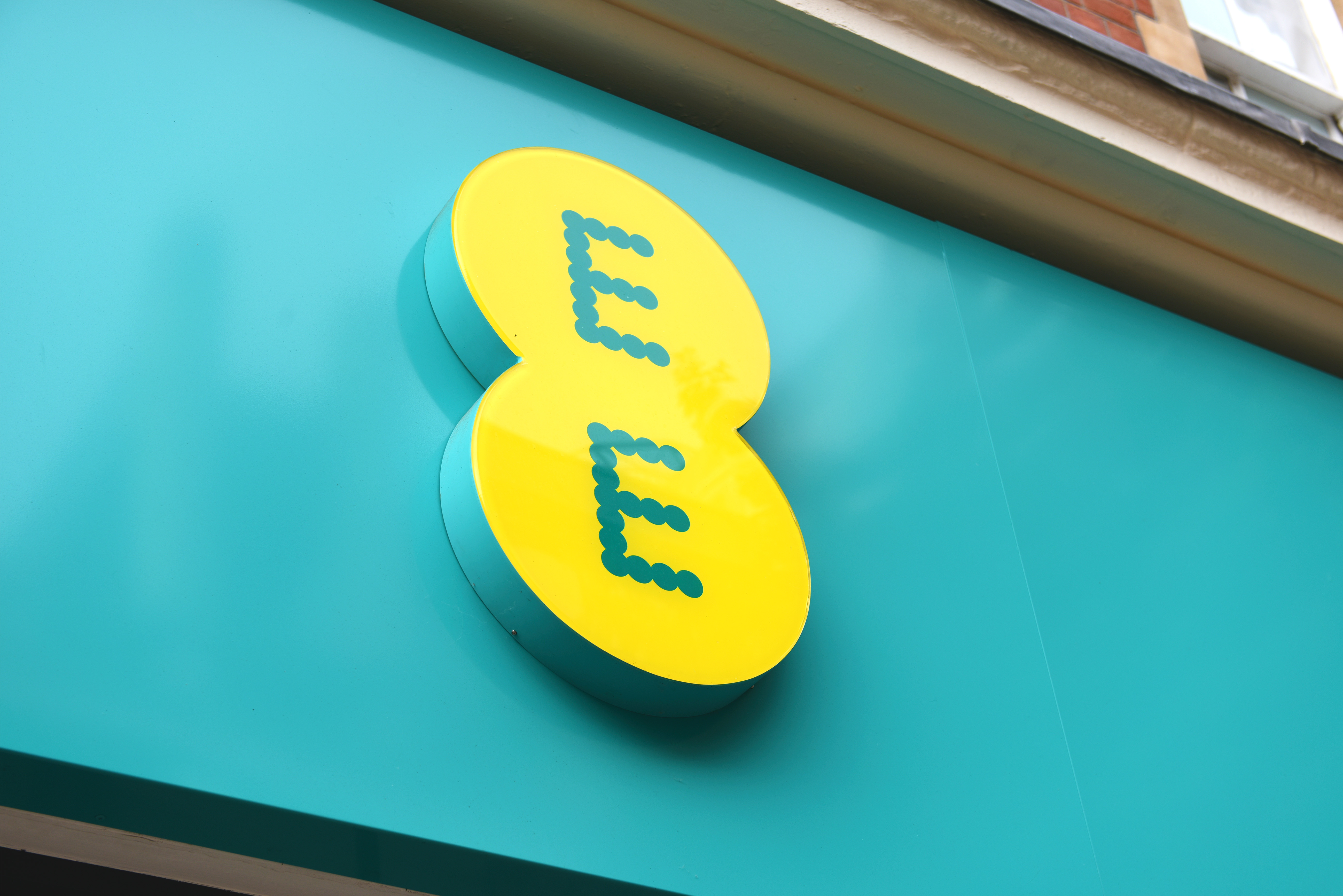 An EE sign on a store