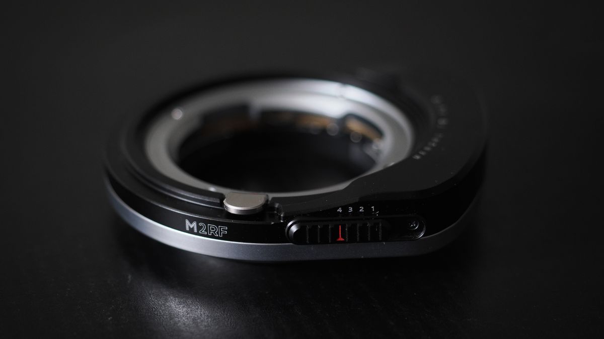 Megadap M2RF adapter on a black surface