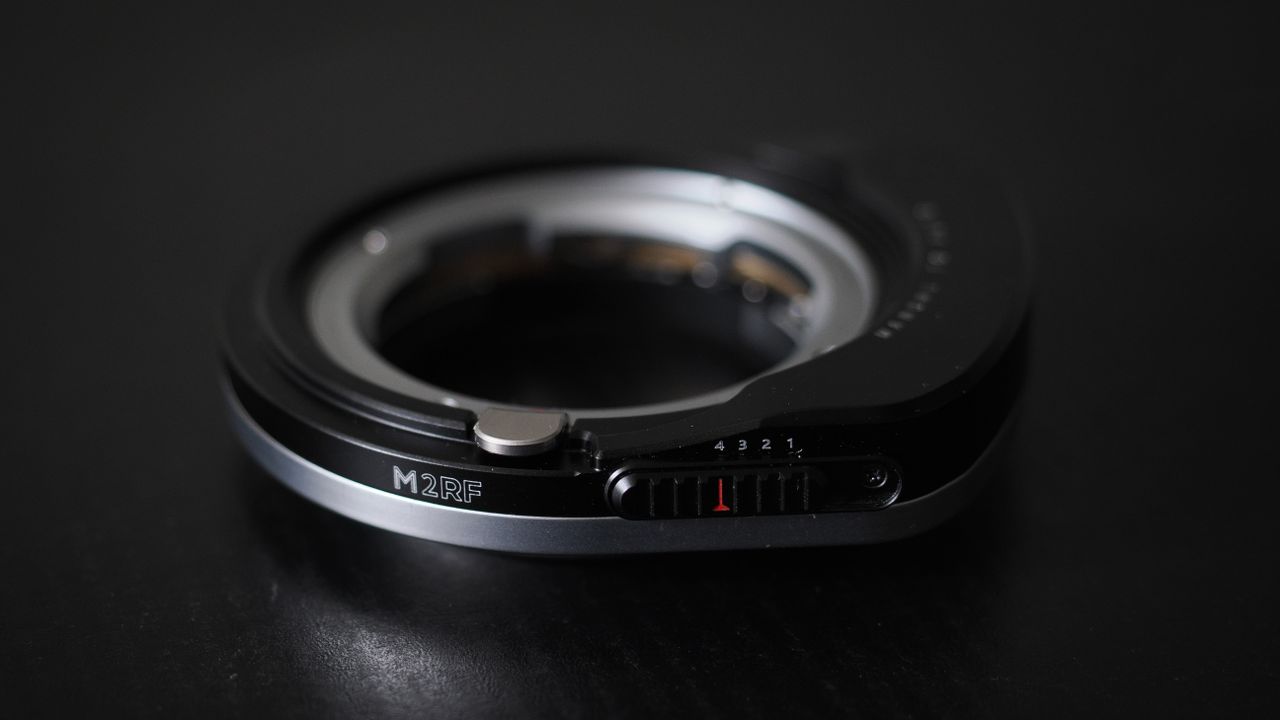 Megadap M2RF adapter on a black surface