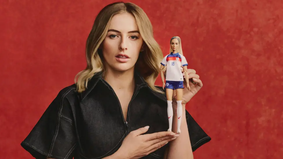 Chloe Kelly with her Barbie doll