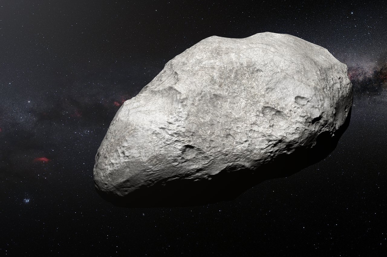 This asteroid 2004 EW95 (shown in this artist's impression) have have been kicked out into the Kuiper Belt by "drunken" gas giants in the early days of our solar system.