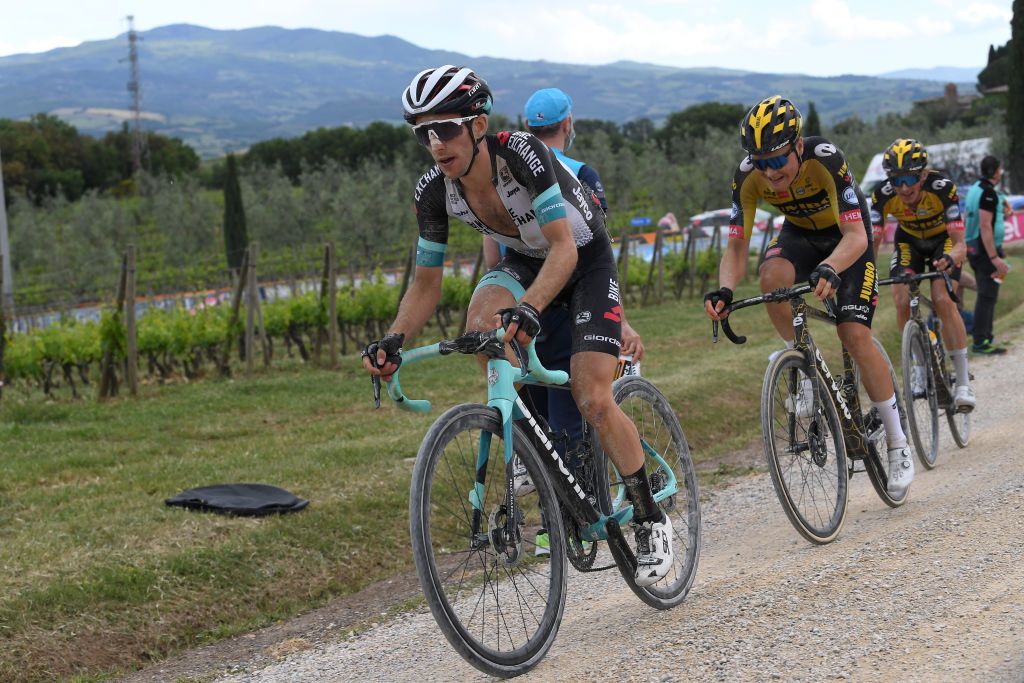 MONTALCINO ITALY MAY 19 Simon Yates of United Kingdom and Team BikeExchange Tobias Foss of Norway and Team Jumbo Visma during the 104th Giro dItalia 2021 Stage 12 a 162km stage from Perugia to Montalcino 554m Dust Gravel Strokes girodiitalia UCIworldtour Giro on May 19 2021 in Montalcino Italy Photo by Tim de WaeleGetty Images