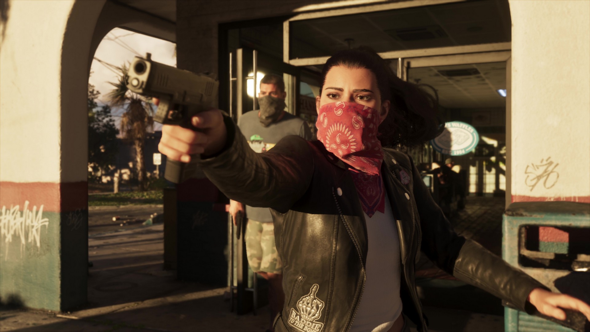 Lucia moves quickly to aim a gun as she and Jason escape from a robbery while wearing bandanas, from the GTA 6 extended look