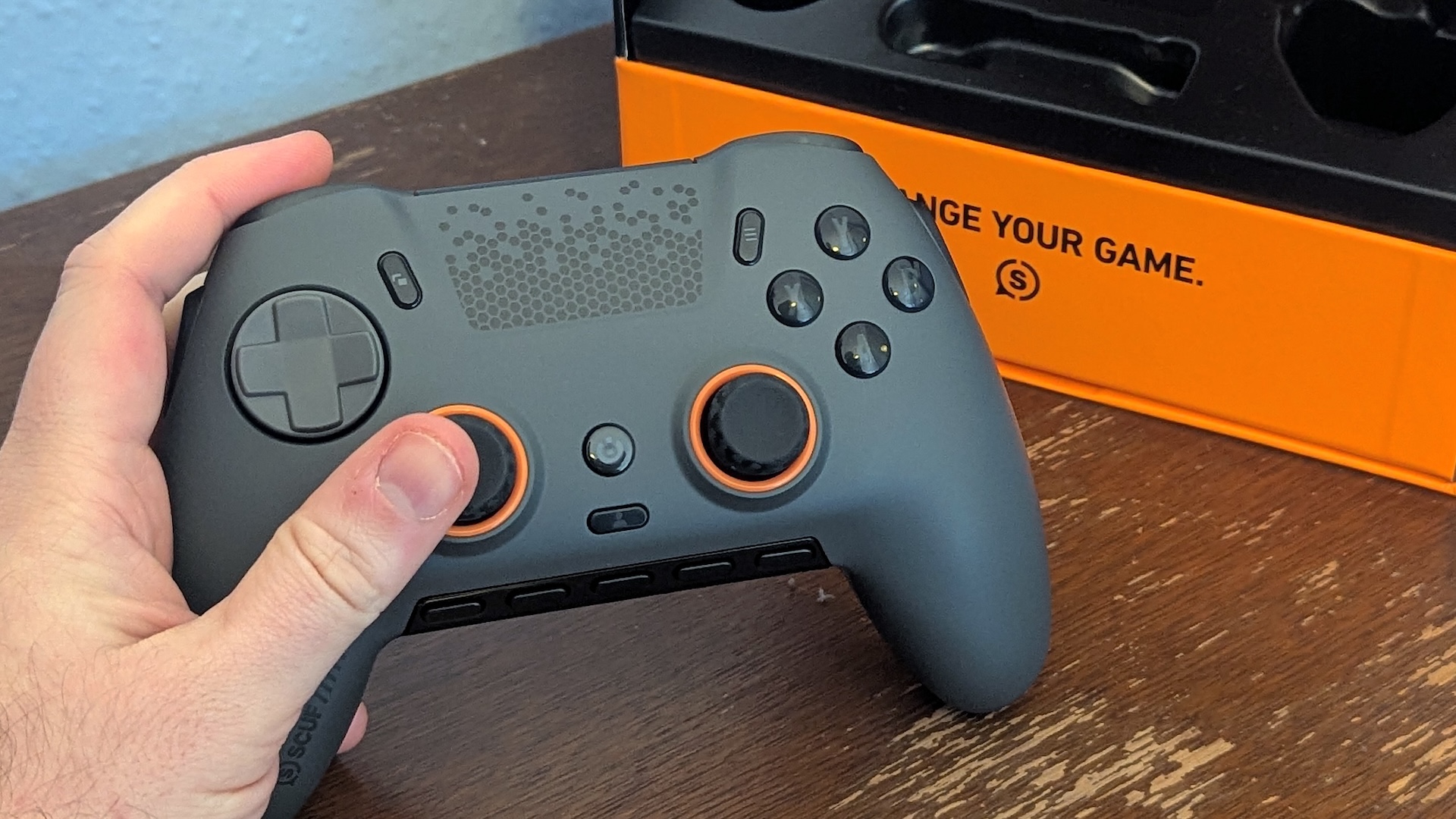 Scuf Envision Pro controller held in hand