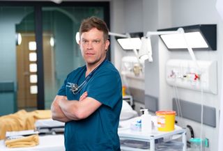 Casualty star William Beck in a posed shot as Dylan Keogh in Holby ED.