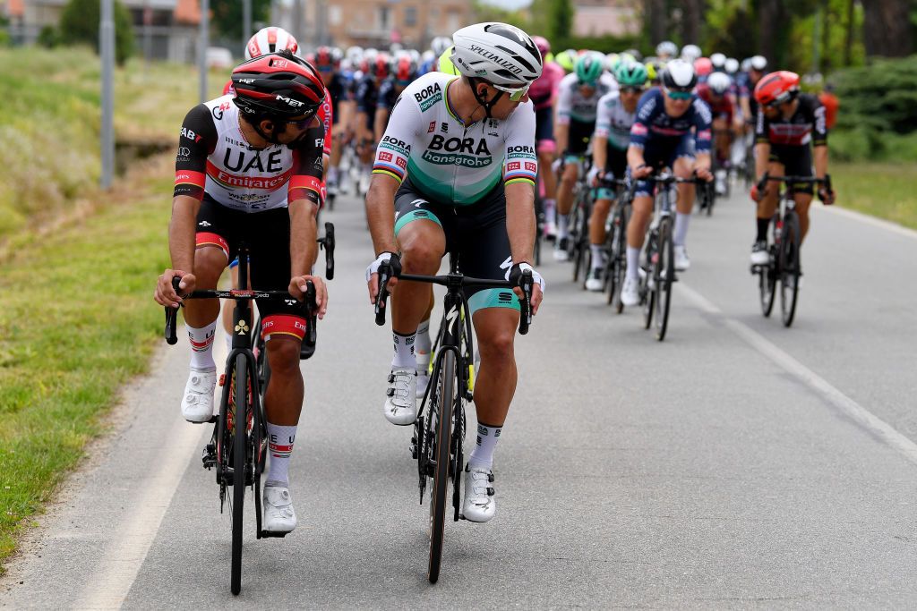 NOVARA ITALY MAY 09 Fernando Gaviria Rendon of Colombia and UAE Team Emirates Peter Sagan of Slovakia and Team Bora Hansgrohe during the 104th Giro dItalia 2021 Stage 2 a 179km stage from Stupinigi Nichelino to Novara girodiitalia Giro UCIworldtour on May 09 2021 in Novara Italy Photo by Tim de WaeleGetty Images
