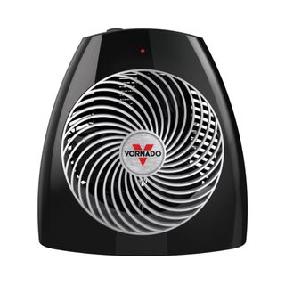 A black triangular shaped electric portable heater