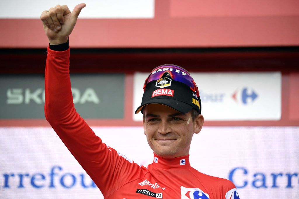 Team JumboVismas US rider Sepp Kuss celebrates on the podium retaining the overall leaders red jersey after the stage 16 of the 2023 La Vuelta cycling tour of Spain a 120 km race between Liencres and Bejes on September 12 2023 Photo by MIGUEL RIOPA AFP Photo by MIGUEL RIOPAAFP via Getty Images