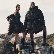 two models wearing cecilie bahnsen x the north face outside