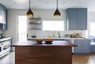 A kitchen with a butcher's block island