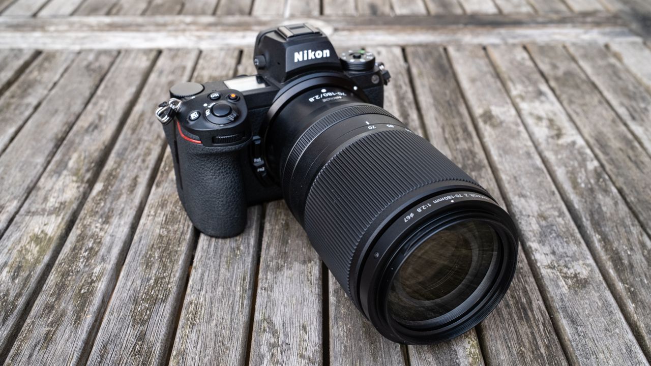 Nikkor Z 70-180mm f/2.8 attached to a Nikon Z 7II on a wooden outdoor table