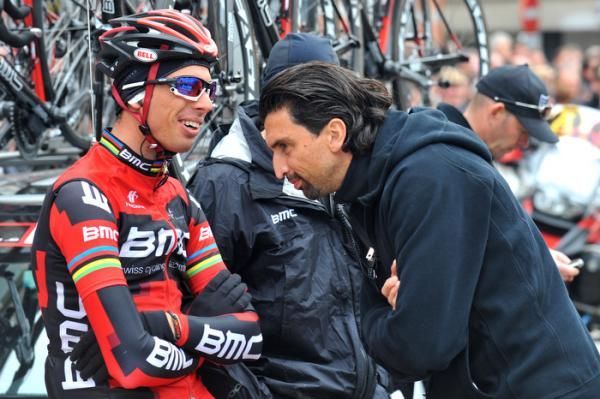 Alessandro Ballan chats with BMC sports director Fabio Baldato before the start.