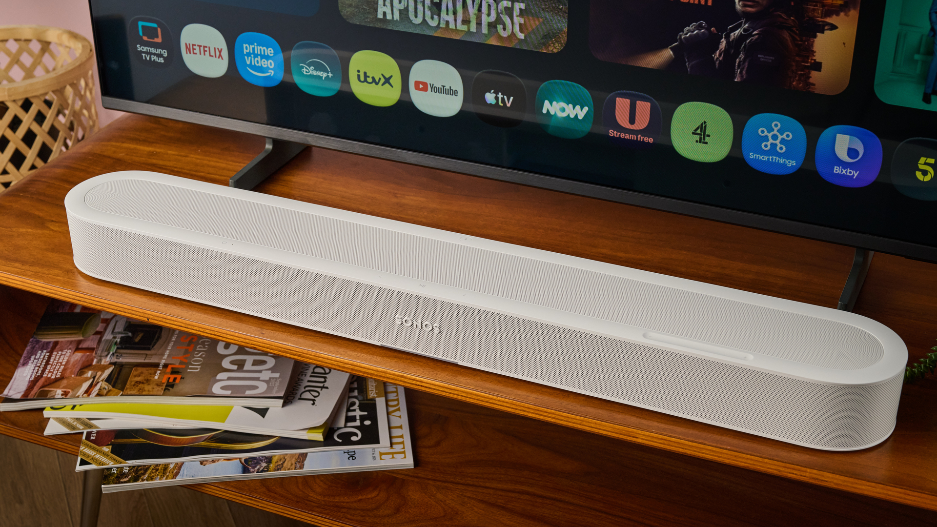 Sonos Beam Ultra below TV on table