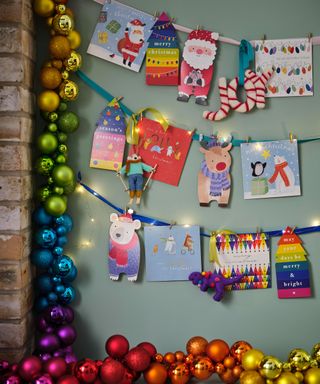 Christmas card ideas ways to display with ribbon and rainbows