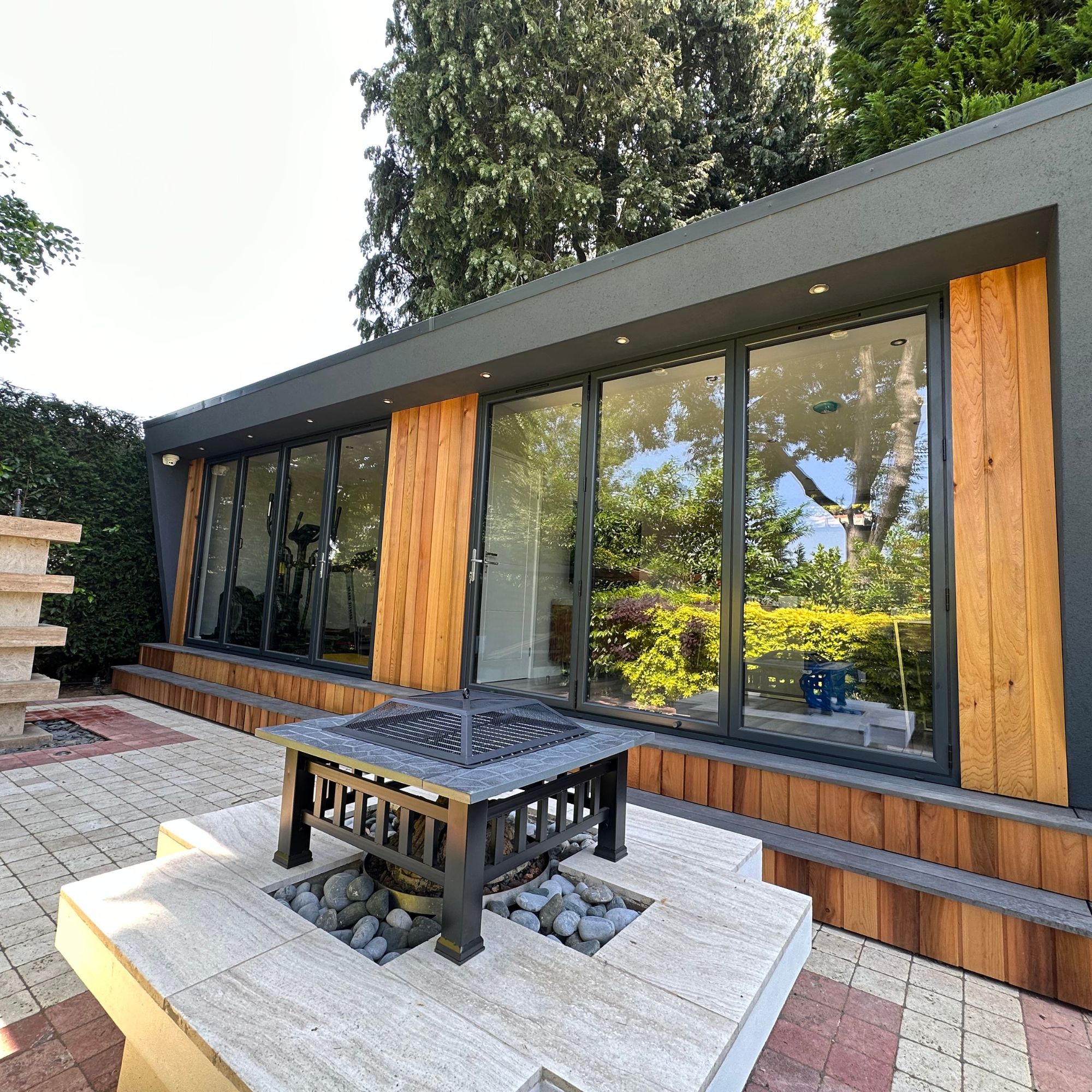 Vivid Green garden room on patio area in garden