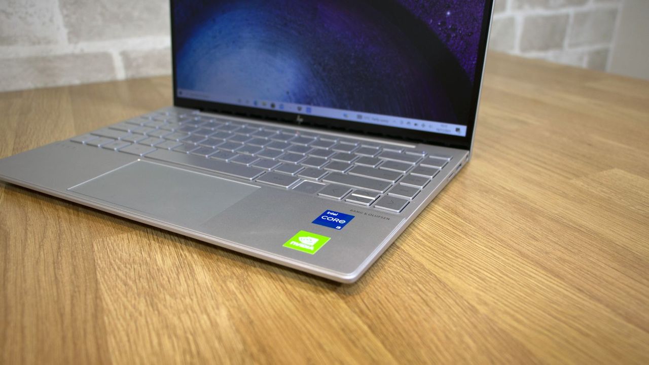 A closeup of the HP Envy 13's logo stickers