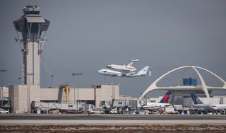 Endeavour Landing in Front of LAX Theme Building