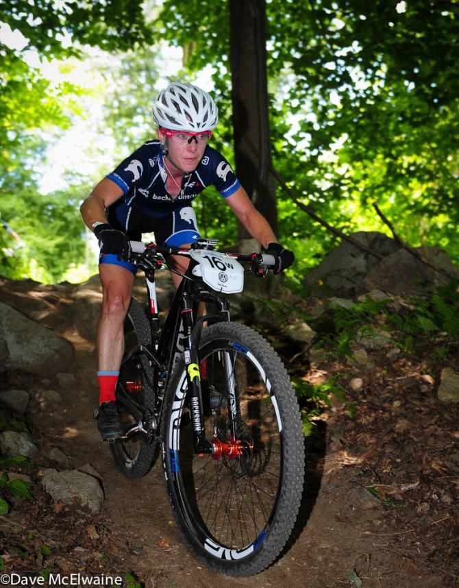 Chloe Woodruff (Backcountry.com) descending in the woods