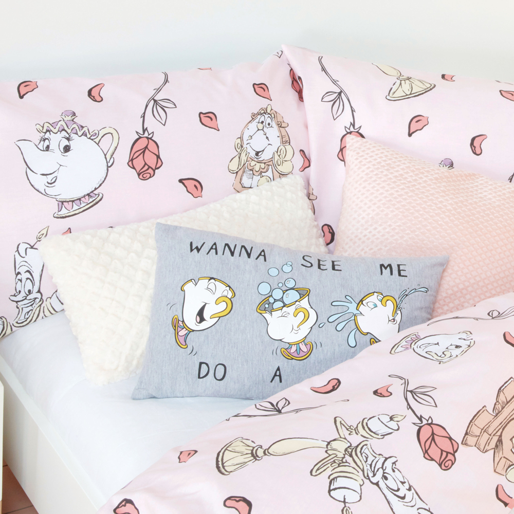 bed room with disneys beauty and the beast bedding