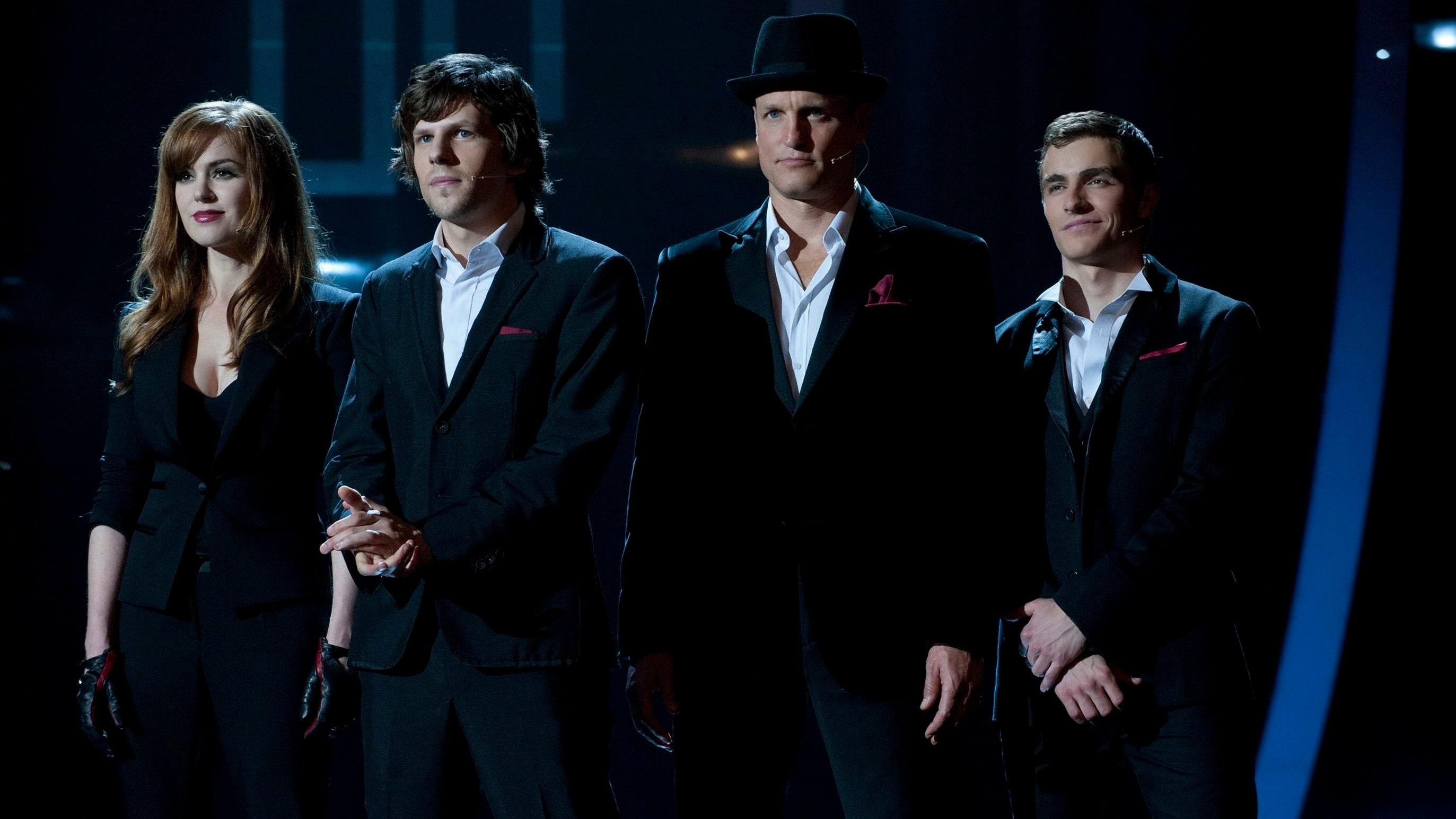 L-R: Woody Harrelson, Isla Fisher, Jesse Eisenberg and Dave Franco on stage as the Four Horsemen in a scene from "Now You See Me"