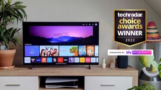 LG C2 in living room alongside TechRadar Choice Awards Winner logo