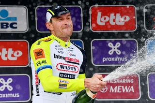 SCHOTEN BELGIUM APRIL 06 Alexander Kristoff of Norway and Team Intermarch Wanty Gobert Matriaux celebrates winning the race on the podium ceremony after the 110th Scheldeprijs 2022 Mens Elite a 1987km one day race from Terneuzen to Schoten SP22 on April 06 2022 in Schoten Belgium Photo by Luc ClaessenGetty Images