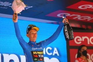 COGNE ITALY MAY 22 Koen Bouwman of Netherlands and Team Jumbo Visma celebrates at podium as Blue Mountain Jersey winner during the 105th Giro dItalia 2022 Stage 15 a 177km stage from Rivarolo Canavese to Cogne 1622m Giro WorldTour on May 22 2022 in Cogne Italy Photo by Michael SteeleGetty Images