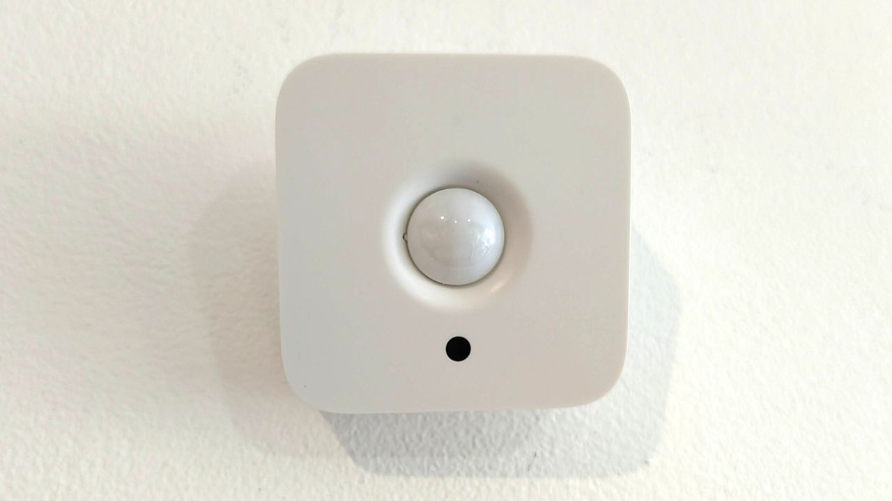 Philips Hue Motion Sensor mounted on wall