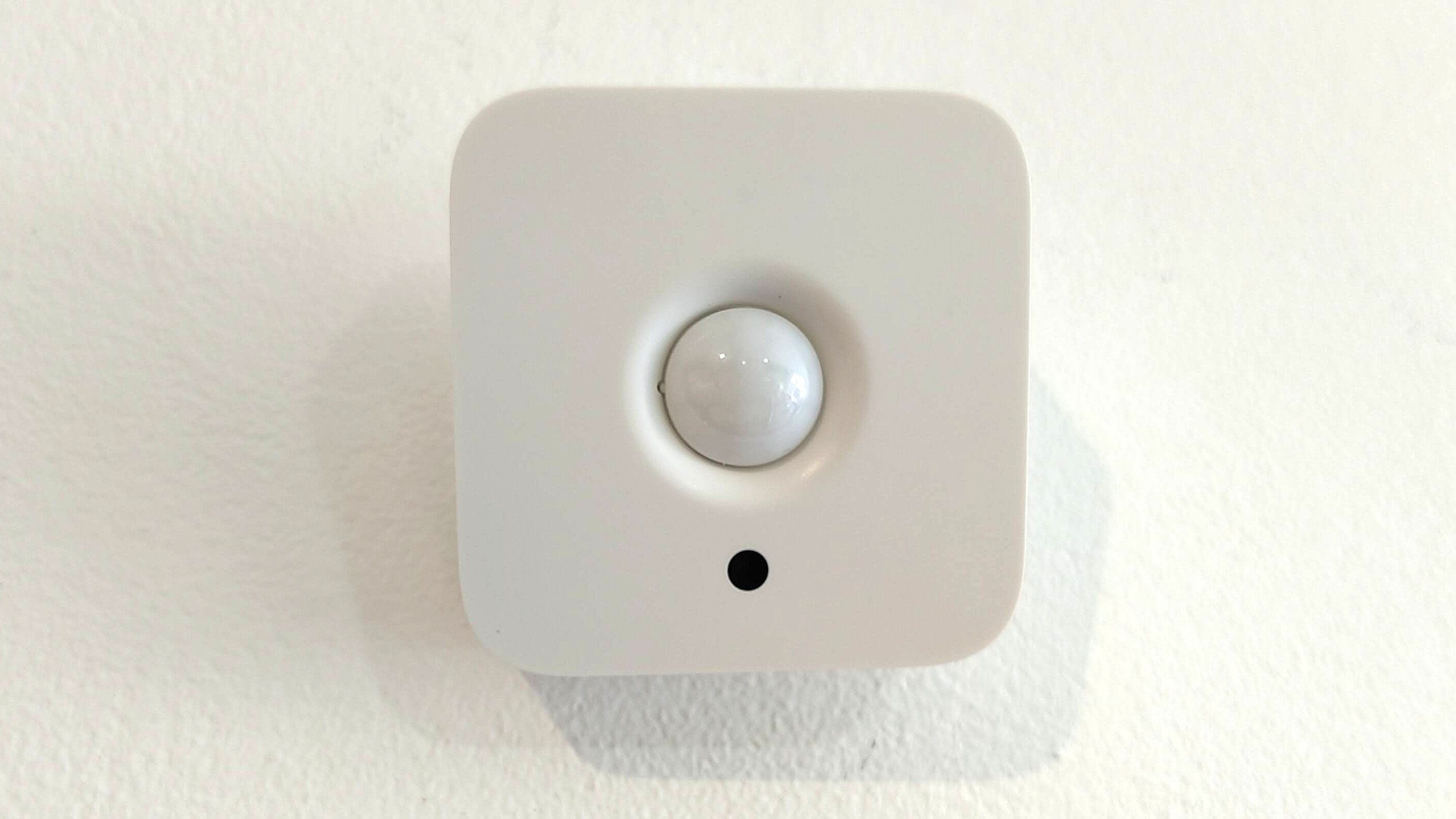 Philips Hue Motion Sensor mounted on wall