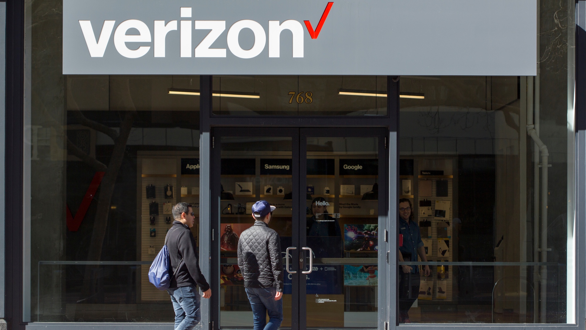 Verizon sign on top of a store