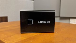 The Samsung T7 Touch external hard drive on a blank background