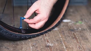 Removing the core from a tubeless valve