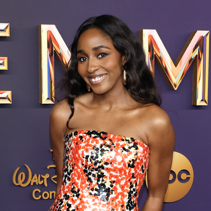 Ayo Edebiri attends the 76th Primetime Emmy Awards at Peacock Theater on September 15, 2024 in Los Angeles, California wearing a black and orange sequin gown