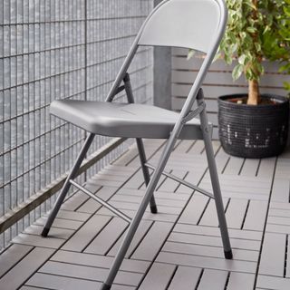 metal chair in grey balcony