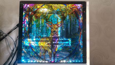 A stained glass-style side panel for a gaming PC