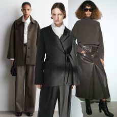 From left to right. One model wears white shirt, coat and trousers. The next model wears a pinstripe set with a white shirt under it. Last model wears gray sweater with pleated leather skirt and boots. 