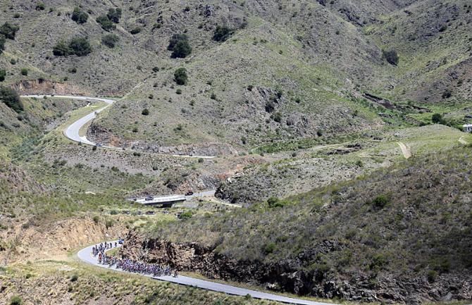The Tour de San Luis peloton amidst some remote terrain during stage 3.