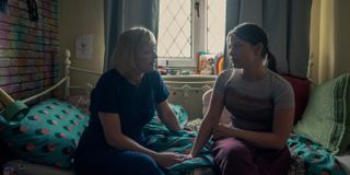 Christine Tremarco as Manda Miller and Amelie Pease as Lisa Miller talking in the teenager's bedroom