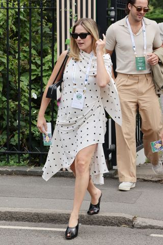 Margot Robbie wore two of 2024's most elegant fashion trends at Wimbledon: Polka dots and two-tone bags