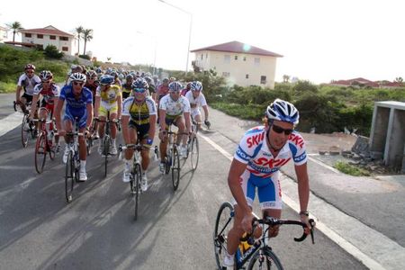 Kenny Van Hummel in front of a jovial peloton.