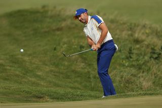 Photo of Sergio Garcia hitting a chip shot at the Ryder Cup