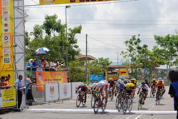 Sergey Kudentsov (Polygon Sweet Nice) sprints to victory.